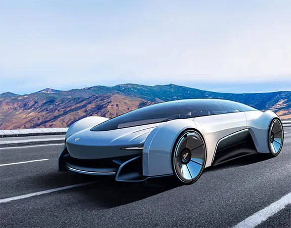 White concept electric car on a road with mountains in the distance