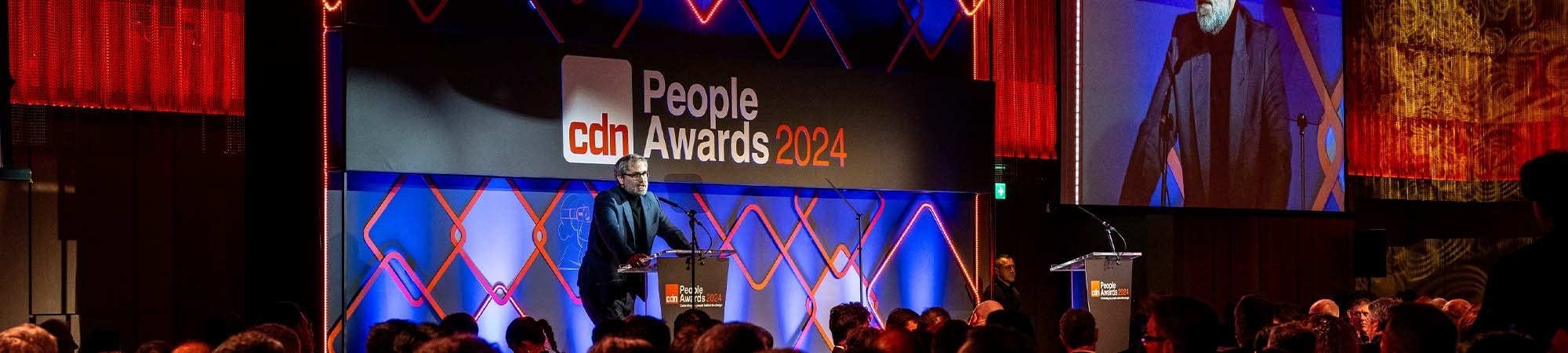 Car Design News editor speaking at the CDN People Awards 2024