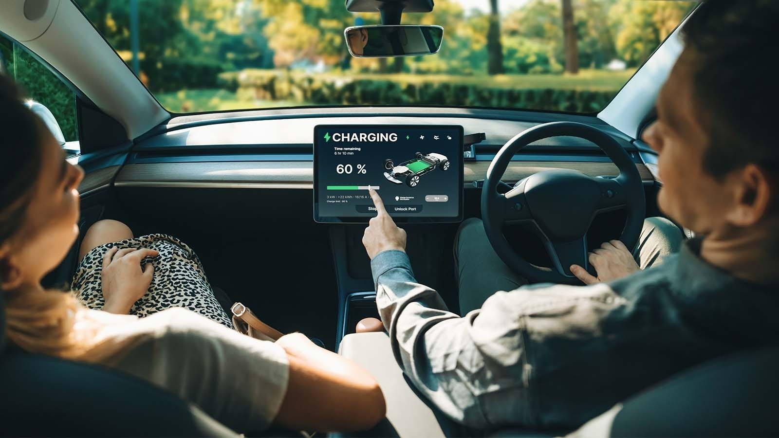 Electric vehicle infotainment screen showing charge status