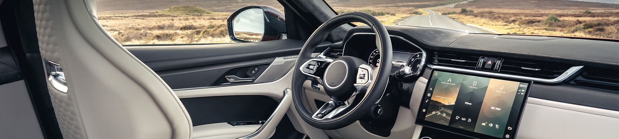 Car interior on a country road