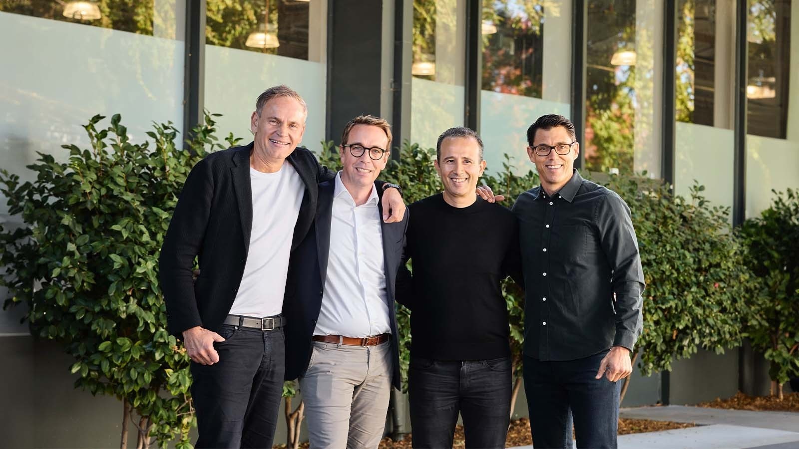 Rivian and Volkswagen executives as part of a new joint venture